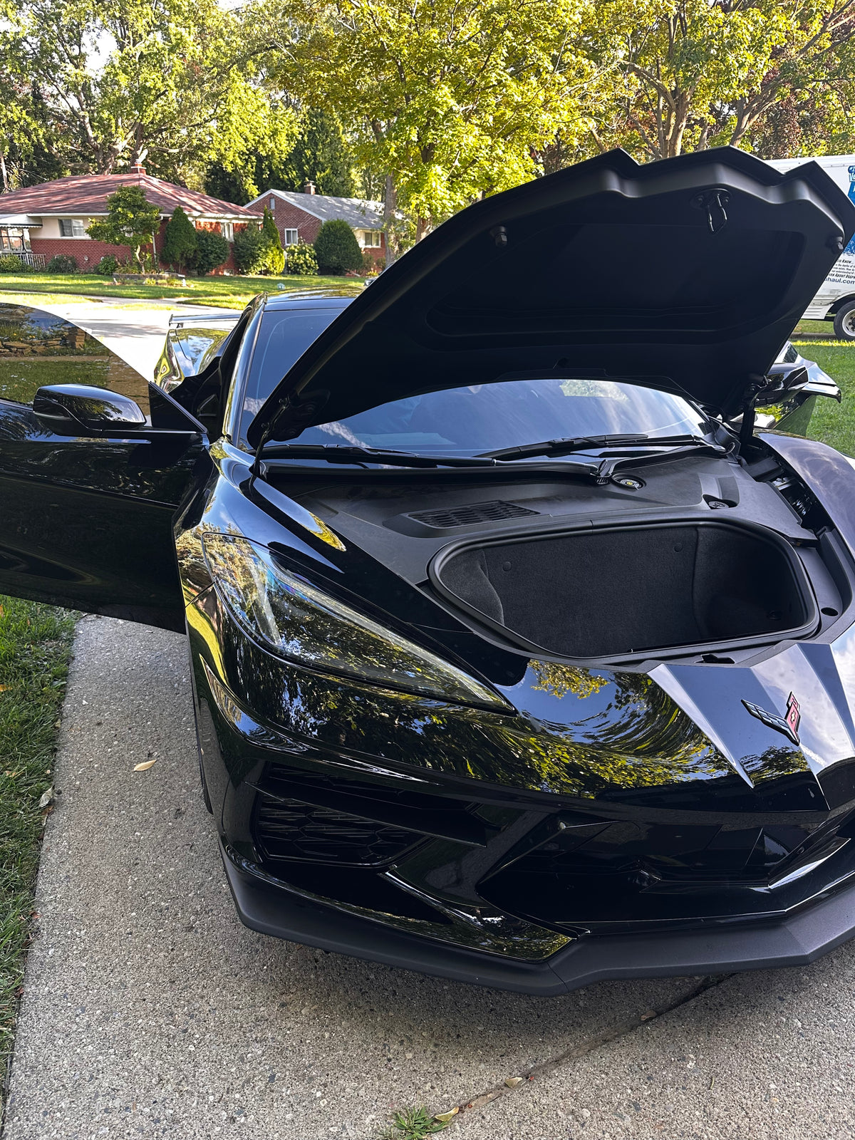 Black Chevrolet Corvette during a Corsa Nero kill switch installation